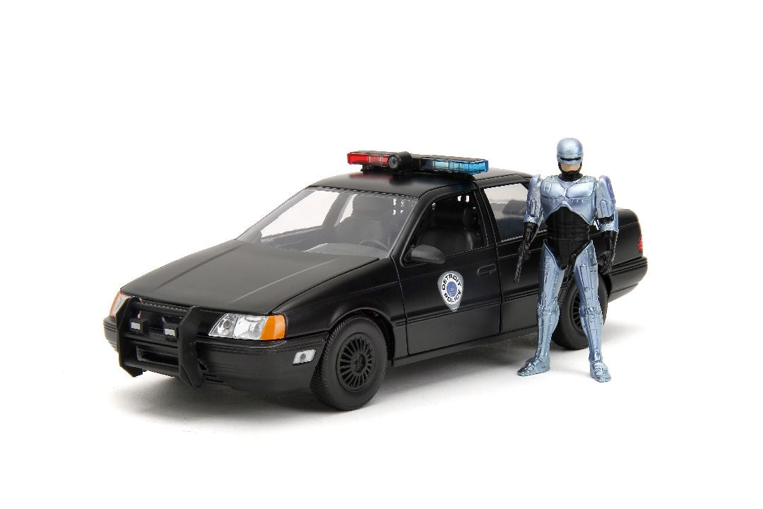 Jada 1/24 "Hollywood Rides" 1986 OCP Ford Taurus w/ RoboCop HPD